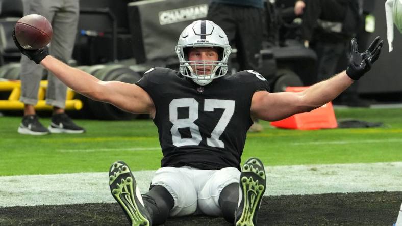 Nov 13, 2022; Paradise, Nevada, USA; Las Vegas Raiders tight end Foster Moreau (87) celebrates after scoring a touchdown against the Indianapolis Colts during the first half at Allegiant Stadium. Mandatory Credit: Stephen R. Sylvanie-USA TODAY Sports