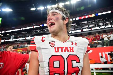 Dec 2, 2022; Las Vegas, NV, USA; Utah Utes tight end Dalton Kincaid (86) celebrates the victory against the Southern California Trojans in the PAC-12 Football Championship at Allegiant Stadium. Mandatory Credit: Gary A. Vasquez-USA TODAY Sports