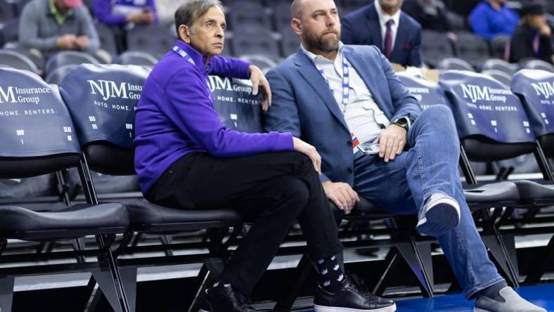 Dec 13, 2022; Philadelphia, Pennsylvania, USA; Sacramento Kings owner Vivek Ranadive (L) and general manager Monte McNair (R) look on during warm ups before a game against the Philadelphia 76ers at Wells Fargo Center. Mandatory Credit: Bill Streicher-USA TODAY Sports