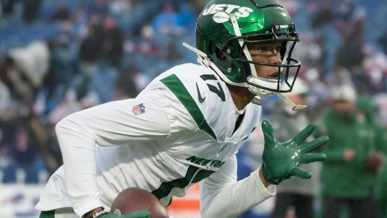 Dec 11, 2022; Orchard Park, New York, USA; New York Jets wide receiver Garrett Wilson (17) warms up before a game against the Buffalo Bills at Highmark Stadium. Mandatory Credit: Mark Konezny-USA TODAY Sports