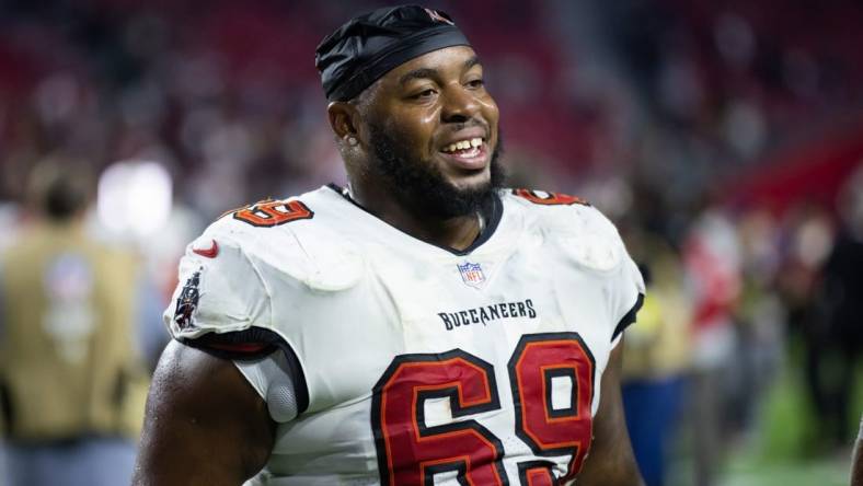 Dec 25, 2022; Glendale, Arizona, USA; Tampa Bay Buccaneers guard Shaq Mason (69) against the Arizona Cardinals at State Farm Stadium. Mandatory Credit: Mark J. Rebilas-USA TODAY Sports