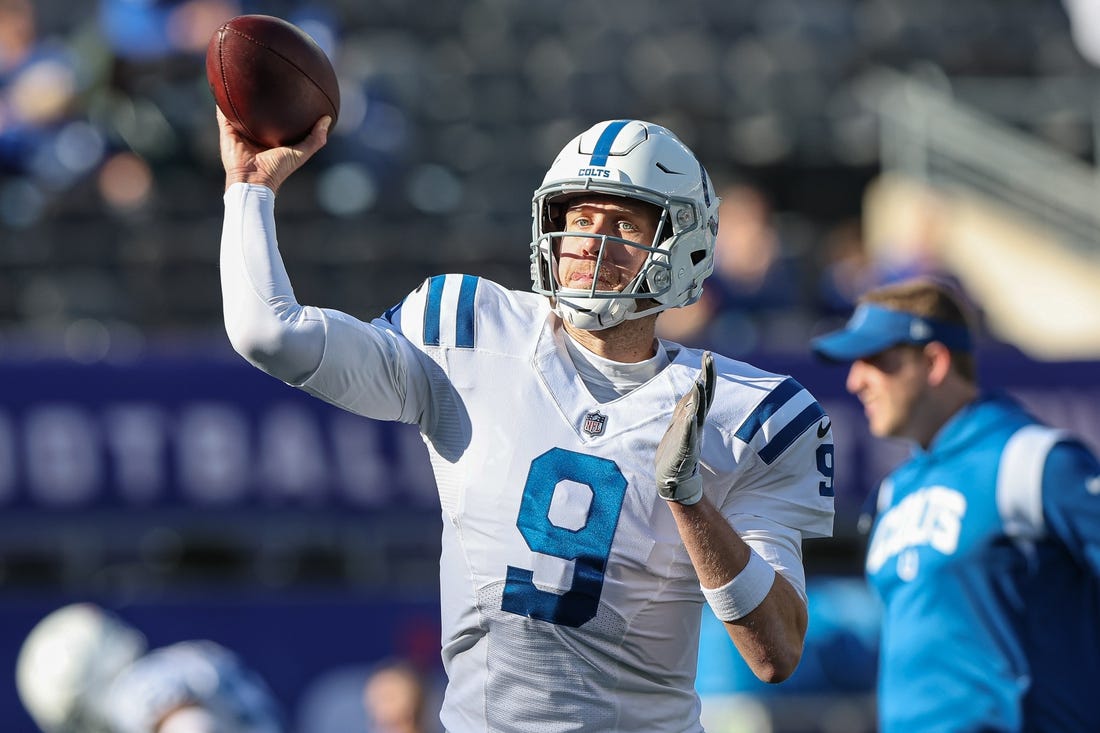 Jan 1, 2023; East Rutherford, New Jersey, USA; Indianapolis Colts quarterback Nick Foles (9) warms up before the game against the New York Giants at MetLife Stadium. Mandatory Credit: Vincent Carchietta-USA TODAY Sports