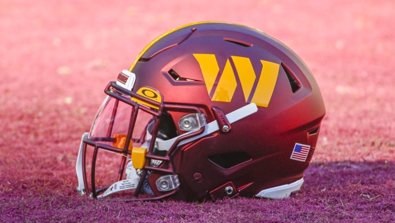 Jan 1, 2023; Landover, Maryland, USA; Washington Commanders helmet on the field before the game against the Cleveland Browns at FedExField. Mandatory Credit: Brad Mills-USA TODAY Sports