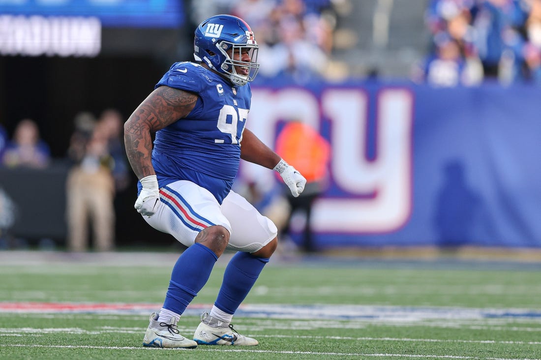 Jan 1, 2023; East Rutherford, New Jersey, USA; New York Giants defensive tackle Dexter Lawrence (97) celebrates a defensive stop during the second half against the Indianapolis Colts at MetLife Stadium. Mandatory Credit: Vincent Carchietta-USA TODAY Sports