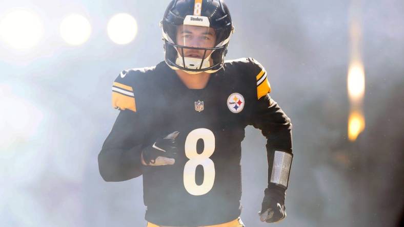 Jan 8, 2023; Pittsburgh, Pennsylvania, USA;  Pittsburgh Steelers quarterback Kenny Pickett (8) takes the field against the Cleveland Browns during the first quarter at Acrisure Stadium. Mandatory Credit: Charles LeClaire-USA TODAY Sports