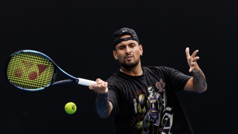Jan 15, 2023; Melbourne, Victoria, Australia; Nick Kyrgios of Australia hits a shot during a practice session on court 16 at Melbourne Park. Mandatory Credit: Mike Frey-USA TODAY Sports