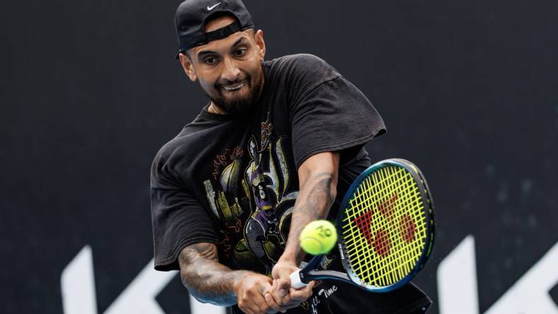 Jan 15, 2023; Melbourne, Victoria, Australia; Nick Kyrgios of Australia hits a shot during a practice session on court 16 at Melbourne Park. Mandatory Credit: Mike Frey-USA TODAY Sports