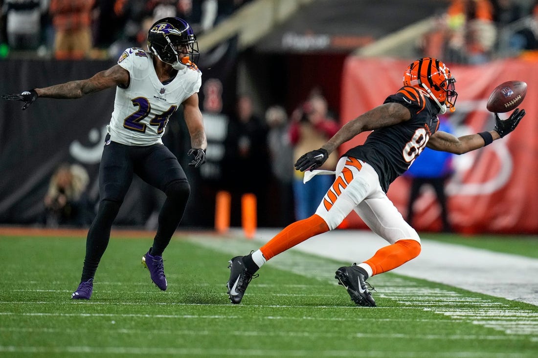 Cincinnati Bengals wide receiver Tee Higgins (85) is unable to hold onto a pass under pressure from Baltimore Ravens cornerback Marcus Peters (24) in the third quarter during an NFL wild-card playoff football game between the Baltimore Ravens and the Cincinnati Bengals, Sunday, Jan. 15, 2023, at Paycor Stadium in Cincinnati. The Bengals advanced to the Divisional round of the playoffs with a 24-17 win over the Ravens.

Baltimore Ravens At Cincinnati Bengals Afc Wild Card Jan 15 302