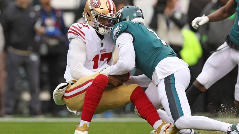 Jan 29, 2023; Philadelphia, Pennsylvania, USA; Philadelphia Eagles linebacker Haason Reddick (7) sacks San Francisco 49ers quarterback Josh Johnson (17) during the first quarter in the NFC Championship game at Lincoln Financial Field. Mandatory Credit: Bill Streicher-USA TODAY Sports