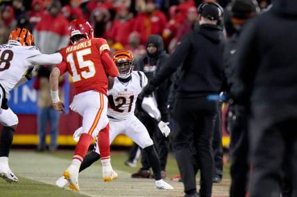 Cincinnati Bengals defensive end Joseph Ossai (58) is called for a roughing-the-passer penalty as Kansas City Chiefs quarterback Patrick Mahomes (15) is hit out of bounds in the fourth quarter during the AFC championship NFL game between the Cincinnati Bengals and the Kansas City Chiefs, Sunday, Jan. 29, 2023, at GEHA Field at Arrowhead Stadium in Kansas City, Mo. The Kansas City Chiefs lead the Cincinnati Bengals, 13-6, at halftime.

Cincinnati Bengals At Kansas City Chiefs Afc Championship Jan 29 0280