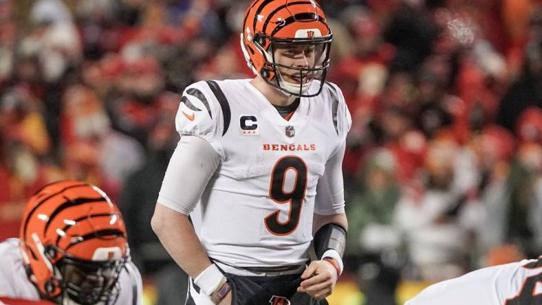 Jan 29, 2023; Kansas City, Missouri, USA; Cincinnati Bengals quarterback Joe Burrow (9) readies for the snap against the Kansas City Chiefs during the AFC Championship game at GEHA Field at Arrowhead Stadium. Mandatory Credit: Denny Medley-USA TODAY Sports