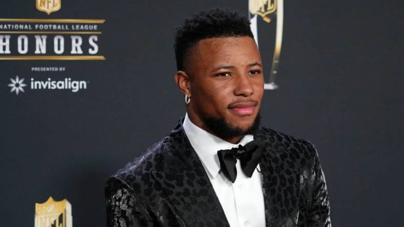 Feb 9, 2023; Phoenix, Arizona, US; Saquon Barkley poses for a photo on the red carpet before the NFL Honors award show at Symphony Hall. Mandatory Credit: Kirby Lee-USA TODAY Sports