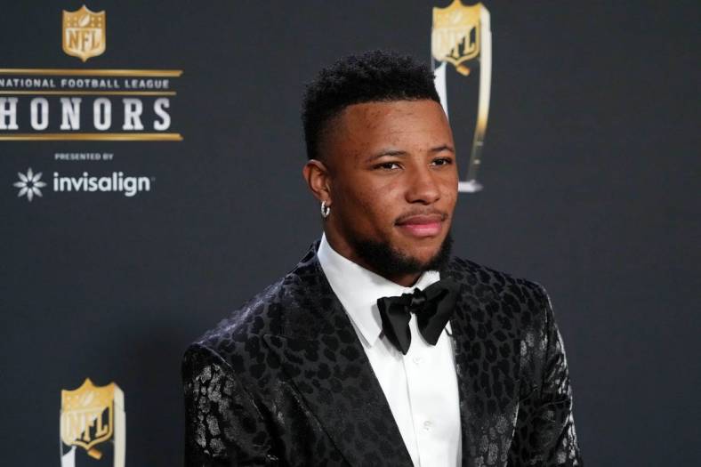 Feb 9, 2023; Phoenix, Arizona, US; Saquon Barkley poses for a photo on the red carpet before the NFL Honors award show at Symphony Hall. Mandatory Credit: Kirby Lee-USA TODAY Sports