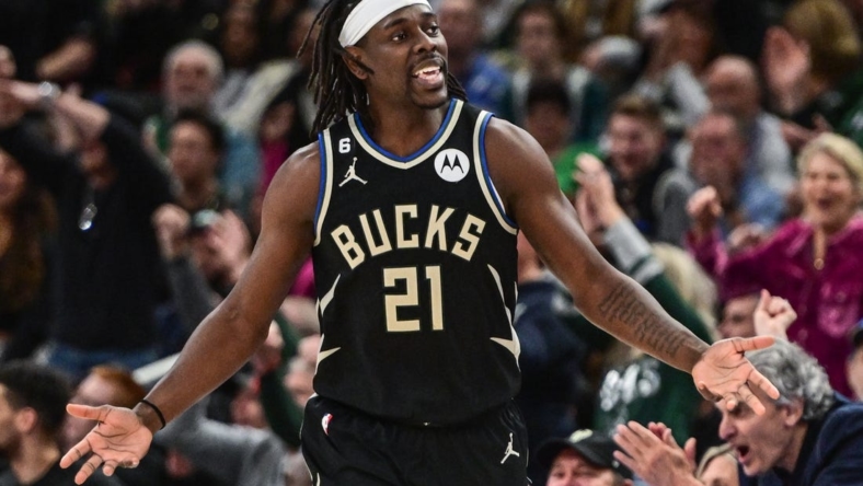 Feb 14, 2023; Milwaukee, Wisconsin, USA; Milwaukee Bucks guard Jrue Holiday (21) reacts after scoring a basket in the fourth quarter during game against the Boston Celtics at Fiserv Forum. Mandatory Credit: Benny Sieu-USA TODAY Sports