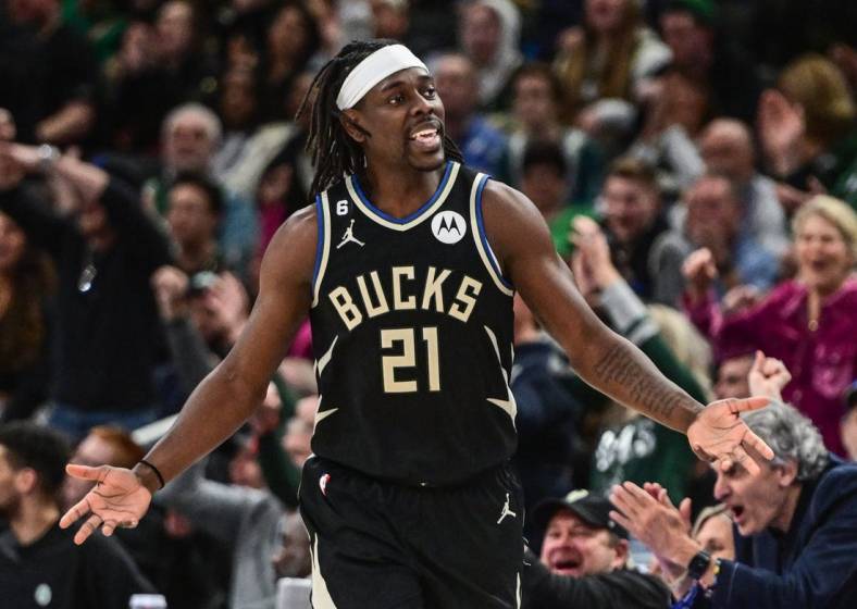 Feb 14, 2023; Milwaukee, Wisconsin, USA; Milwaukee Bucks guard Jrue Holiday (21) reacts after scoring a basket in the fourth quarter during game against the Boston Celtics at Fiserv Forum. Mandatory Credit: Benny Sieu-USA TODAY Sports