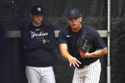 Feb 16, 2023; Tampa, FL, USA; New York Yankees relief pitcher Jonathan Loaisiga (43) pitches during spring training practice at George M. Steinbrenner Field. Mandatory Credit: Kim Klement-USA TODAY Sports