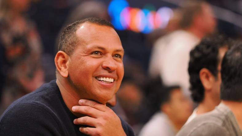 Feb 26, 2023; San Francisco, California, USA; Retired baseball player Alex Rodriguez sits court side before the game between the Golden State Warriors and Minnesota Timberwolves at Chase Center. Mandatory Credit: Kelley L Cox-USA TODAY Sports