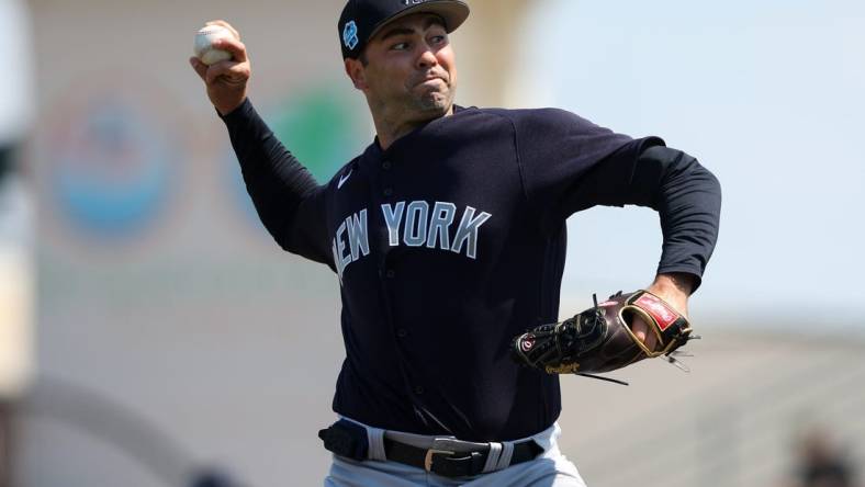 Mar 2, 2023; Bradenton, Florida, USA;  New York Yankees relief pitcher Lou Trivino (56) throws a pitch against the Pittsburgh Pirates in the first inning during spring training at LECOM Park. Mandatory Credit: Nathan Ray Seebeck-USA TODAY Sports