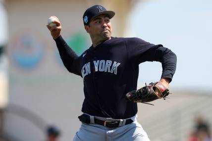 Mar 2, 2023; Bradenton, Florida, USA;  New York Yankees relief pitcher Lou Trivino (56) throws a pitch against the Pittsburgh Pirates in the first inning during spring training at LECOM Park. Mandatory Credit: Nathan Ray Seebeck-USA TODAY Sports