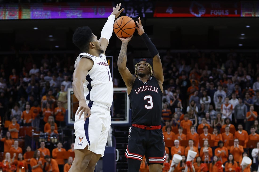 Mar 4, 2023; Charlottesville, Virginia, USA;  Louisville Cardinals guard El Ellis (3) shoots the ball as Virginia Cavaliers forward Jayden Gardner (1) defends /d1h./at John Paul Jones Arena. Mandatory Credit: Geoff Burke-USA TODAY Sports