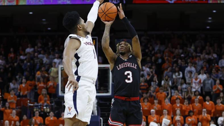 Mar 4, 2023; Charlottesville, Virginia, USA;  Louisville Cardinals guard El Ellis (3) shoots the ball as Virginia Cavaliers forward Jayden Gardner (1) defends /d1h./at John Paul Jones Arena. Mandatory Credit: Geoff Burke-USA TODAY Sports