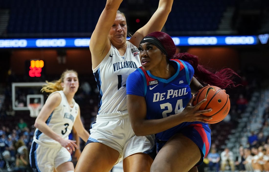 Mar 4, 2023; Uncasville, CT, USA; DePaul Blue Demons forward Aneesah Morrow (24) drives the ball against Villanova Wildcats forward Megan Olbrys (14) in the second half at Mohegan Sun Arena. Mandatory Credit: David Butler II-USA TODAY Sports