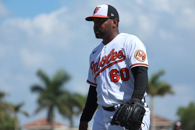 Mar 6, 2023; Sarasota, Florida, USA; Baltimore Orioles relief pitcher Mychal Givens (60) walks back to the dugout after he pitched the fourth inning against the Philadelphia Phillies at Ed Smith Stadium. Mandatory Credit: Kim Klement-USA TODAY Sports