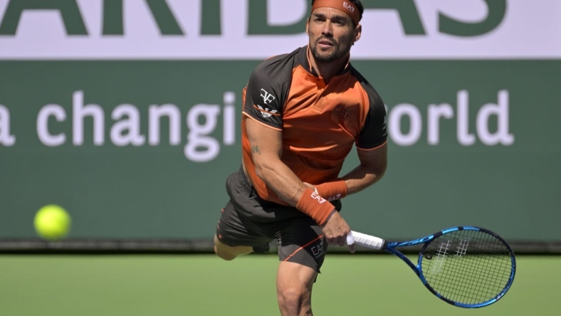 Mar 9, 2023; Indian Wells, CA, USA;  Fabio Fognini  (ITA) serves during his first round match against Ben Shelton (not pictured) on day 4 of the BNP Paribas Open at the Indian Wells Tennis Garden. Mandatory Credit: Jayne Kamin-Oncea-USA TODAY Sports