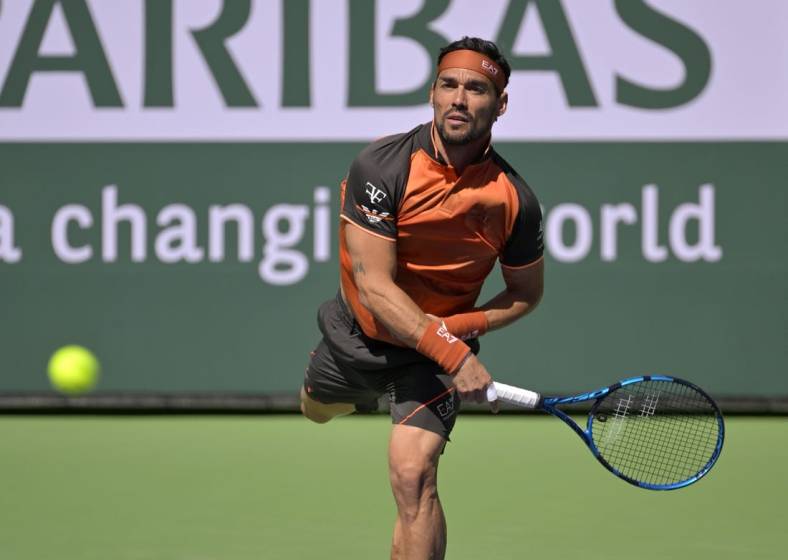 Mar 9, 2023; Indian Wells, CA, USA;  Fabio Fognini  (ITA) serves during his first round match against Ben Shelton (not pictured) on day 4 of the BNP Paribas Open at the Indian Wells Tennis Garden. Mandatory Credit: Jayne Kamin-Oncea-USA TODAY Sports
