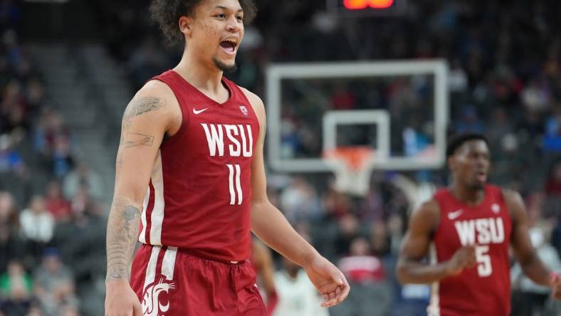 Mar 9, 2023; Las Vegas, NV, USA; Washington State Cougars forward DJ Rodman (11) celebrates after a scoring play against the Oregon Ducks during the first half at T-Mobile Arena. Mandatory Credit: Stephen R. Sylvanie-USA TODAY Sports