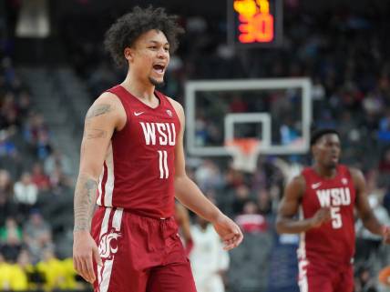 Mar 9, 2023; Las Vegas, NV, USA; Washington State Cougars forward DJ Rodman (11) celebrates after a scoring play against the Oregon Ducks during the first half at T-Mobile Arena. Mandatory Credit: Stephen R. Sylvanie-USA TODAY Sports