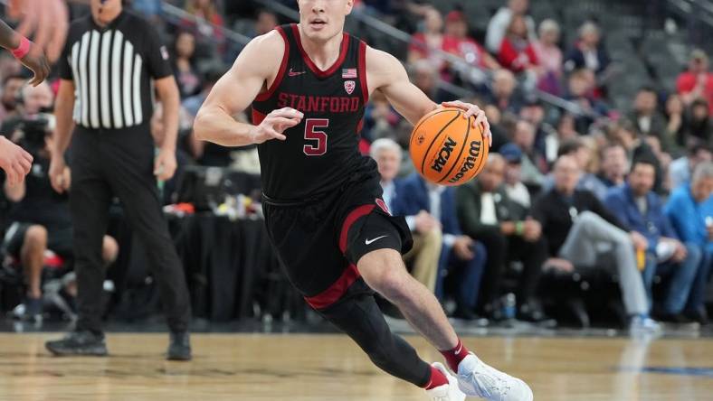 Mar 9, 2023; Las Vegas, NV, USA; Stanford Cardinal guard Michael O'Connell (5) dribbles against the Arizona Wild Cats during the first half at T-Mobile Arena. Mandatory Credit: Stephen R. Sylvanie-USA TODAY Sports