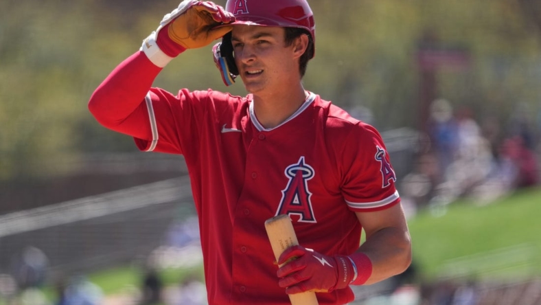 Mar 12, 2023; Phoenix, Arizona, USA; Los Angeles Angels right fielder Mickey Moniak (16) reacts after striking out against the Chicago White Sox during the first inning at Camelback Ranch-Glendale. Mandatory Credit: Joe Camporeale-USA TODAY Sports