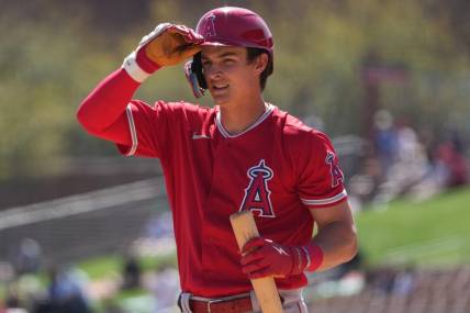 Mar 12, 2023; Phoenix, Arizona, USA; Los Angeles Angels right fielder Mickey Moniak (16) reacts after striking out against the Chicago White Sox during the first inning at Camelback Ranch-Glendale. Mandatory Credit: Joe Camporeale-USA TODAY Sports