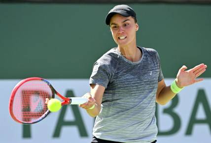 Mar 12, 2023; Indian Wells, CA, USA;   Anhelina Kalinina (UKR)  hits a shot in her third round match against Maria Sakkari (GRE) in the BNP Paribas Open at the Indian Wells Tennis Garden. Mandatory Credit: Jayne Kamin-Oncea-USA TODAY Sports