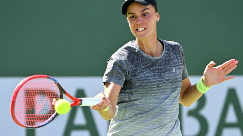 Mar 12, 2023; Indian Wells, CA, USA;   Anhelina Kalinina (UKR)  hits a shot in her third round match against Maria Sakkari (GRE) in the BNP Paribas Open at the Indian Wells Tennis Garden. Mandatory Credit: Jayne Kamin-Oncea-USA TODAY Sports