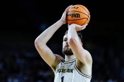 Michigan center Hunter Dickinson (1) attempts a free throw against Toledo during the second half of the first round of the NIT at Crisler Center in Ann Arbor on Tuesday, March 14, 2023.