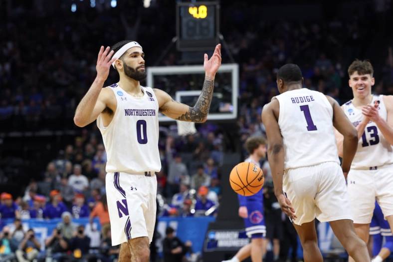 Mar 16, 2023; Sacramento, CA, USA; Northwestern Wildcats guard Boo Buie (0) celebrates after defeating the Boise State Broncos at Golden 1 Center. Mandatory Credit: Kelley L Cox-USA TODAY Sports