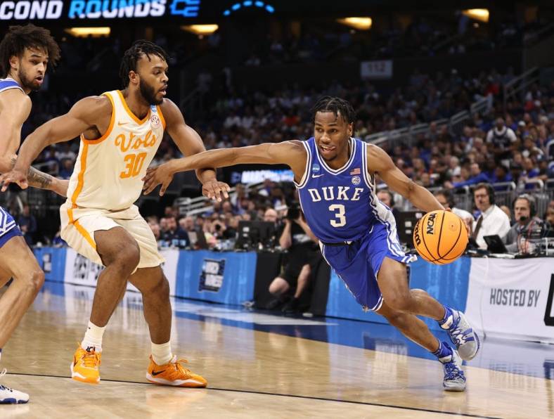 Mar 18, 2023; Orlando, FL, USA;  Duke Blue Devils guard Jeremy Roach (3) drives against Tennessee Volunteers guard Josiah-Jordan James (30) during the first half in the second round of the 2023 NCAA Tournament at Legacy Arena. Mandatory Credit: Matt Pendleton-USA TODAY Sports