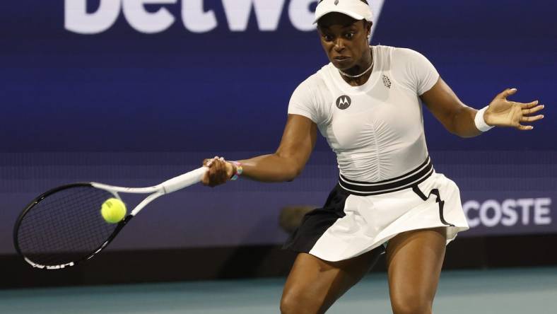 Mar 22, 2023; Miami, Florida, US; Sloane Stephens (USA) hits a forehand against Shelby Rogers (USA) (not pictured) on day three of the Miami Open at Hard Rock Stadium. Mandatory Credit: Geoff Burke-USA TODAY Sports