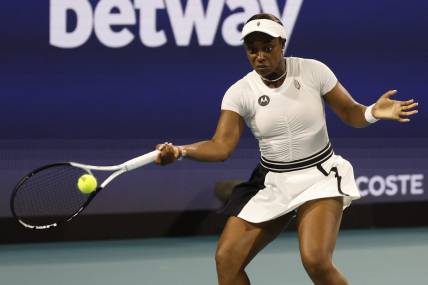 Mar 22, 2023; Miami, Florida, US; Sloane Stephens (USA) hits a forehand against Shelby Rogers (USA) (not pictured) on day three of the Miami Open at Hard Rock Stadium. Mandatory Credit: Geoff Burke-USA TODAY Sports