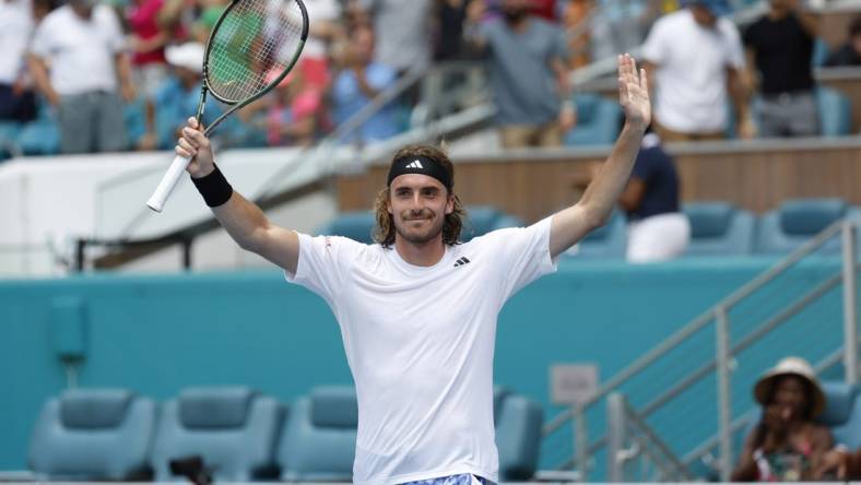 Mar 27, 2023; Miami, Florida, US; Stefanos Tsitsipas (GRE) celebrates after his match against Cristian Garin (CHI) (not pictured) on day eight of the Miami Open at Hard Rock Stadium. Mandatory Credit: Geoff Burke-USA TODAY Sports