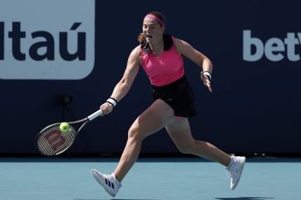 Mar 27, 2023; Miami, Florida, US; Jelena Ostapenko (LAT) hits a forehand against Martina Trevisan (ITA) (not pictured) on day eight of the Miami Open at Hard Rock Stadium. Mandatory Credit: Geoff Burke-USA TODAY Sports