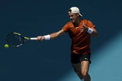 Mar 28, 2023; Miami, Florida, US; Holger Rune (DEN) hits a forehand against Taylor Fritz (USA) (not pictured) on day nine of the Miami Open at Hard Rock  Stadium. Mandatory Credit: Geoff Burke-USA TODAY Sports