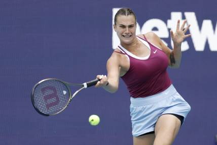 Mar 29, 2023; Miami, Florida, US; Aryna Sabalenka hits a forehand against Sorana Cirstea (ROU) (not pictured) in a women's singles quarterfinal on day ten of the Miami Open at Hard Rock Stadium. Mandatory Credit: Geoff Burke-USA TODAY Sports