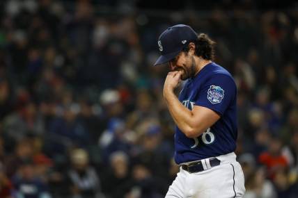 Mar 31, 2023; Seattle, Washington, USA; Seattle Mariners starting pitcher Robbie Ray (38) walks to the dugout during a fourth inning pitching change against the Cleveland Guardians at T-Mobile Park. Mandatory Credit: Joe Nicholson-USA TODAY Sports