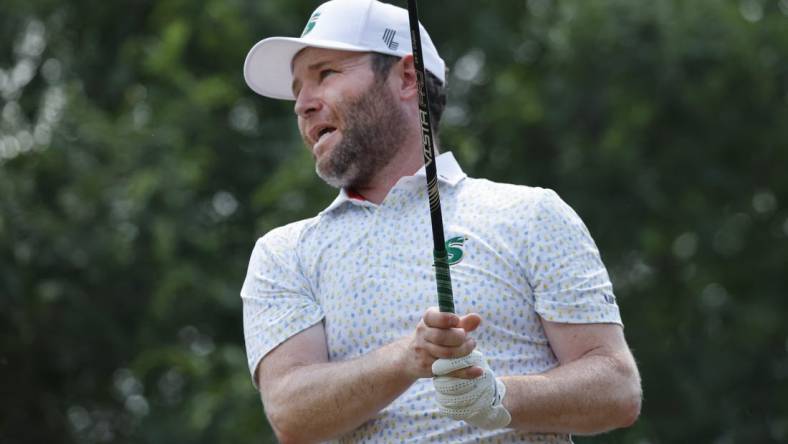 Apr 2, 2023; Orlando, Florida, USA; Branden Grace of the Stinger golf club plays his shot from the sixth tee during the final round of a LIV Golf event at Orange County National. Mandatory Credit: Reinhold Matay-USA TODAY Sports