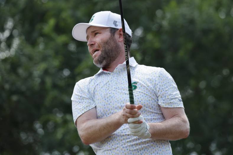Apr 2, 2023; Orlando, Florida, USA; Branden Grace of the Stinger golf club plays his shot from the sixth tee during the final round of a LIV Golf event at Orange County National. Mandatory Credit: Reinhold Matay-USA TODAY Sports