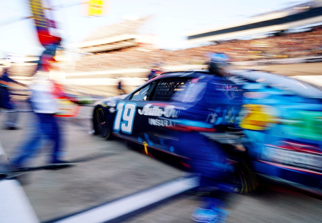 Apr 2, 2023; Richmond, Virginia, USA; NASCAR Cup Series driver Martin Truex Jr. (19) pits during the Toyota Owners 400 at Richmond Raceway. Mandatory Credit: John David Mercer-USA TODAY Sports