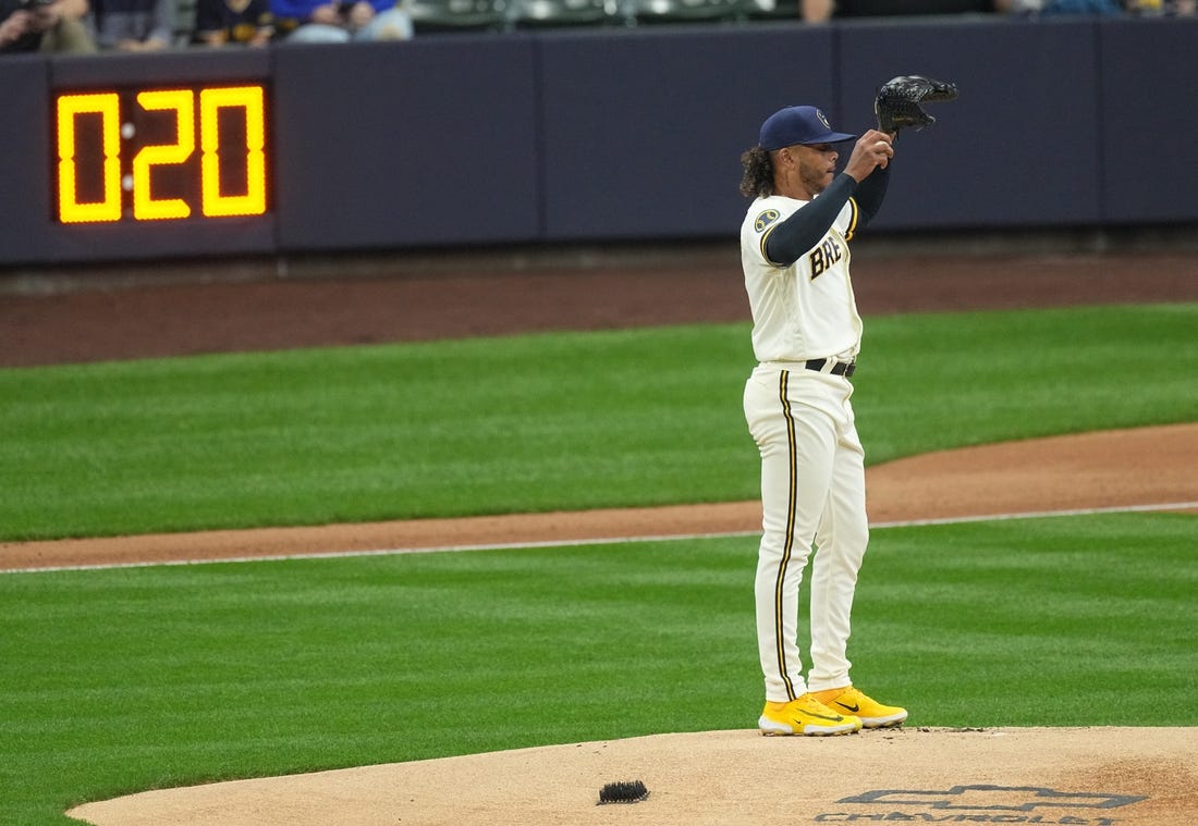 With the pitch timer in the distance, Milwaukee Brewers starting pitcher Freddy Peralta (51) stands on the mound during the first inning of their game against the New York Mets Monday, April 3, 2023 at American Family Field in Milwaukee, Wis.

Brewers03 5